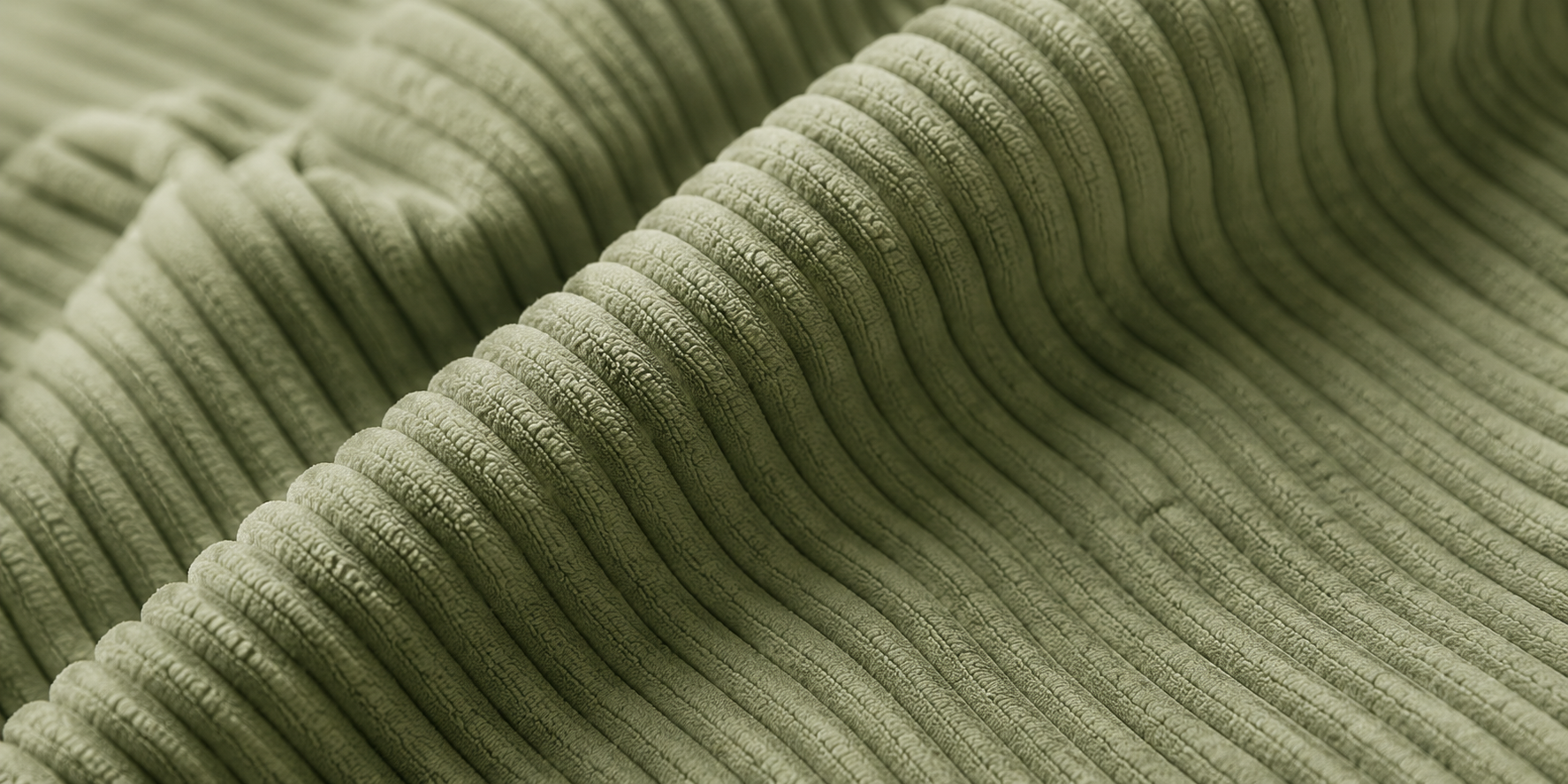 Close-up of soft olive corduroy fabric
